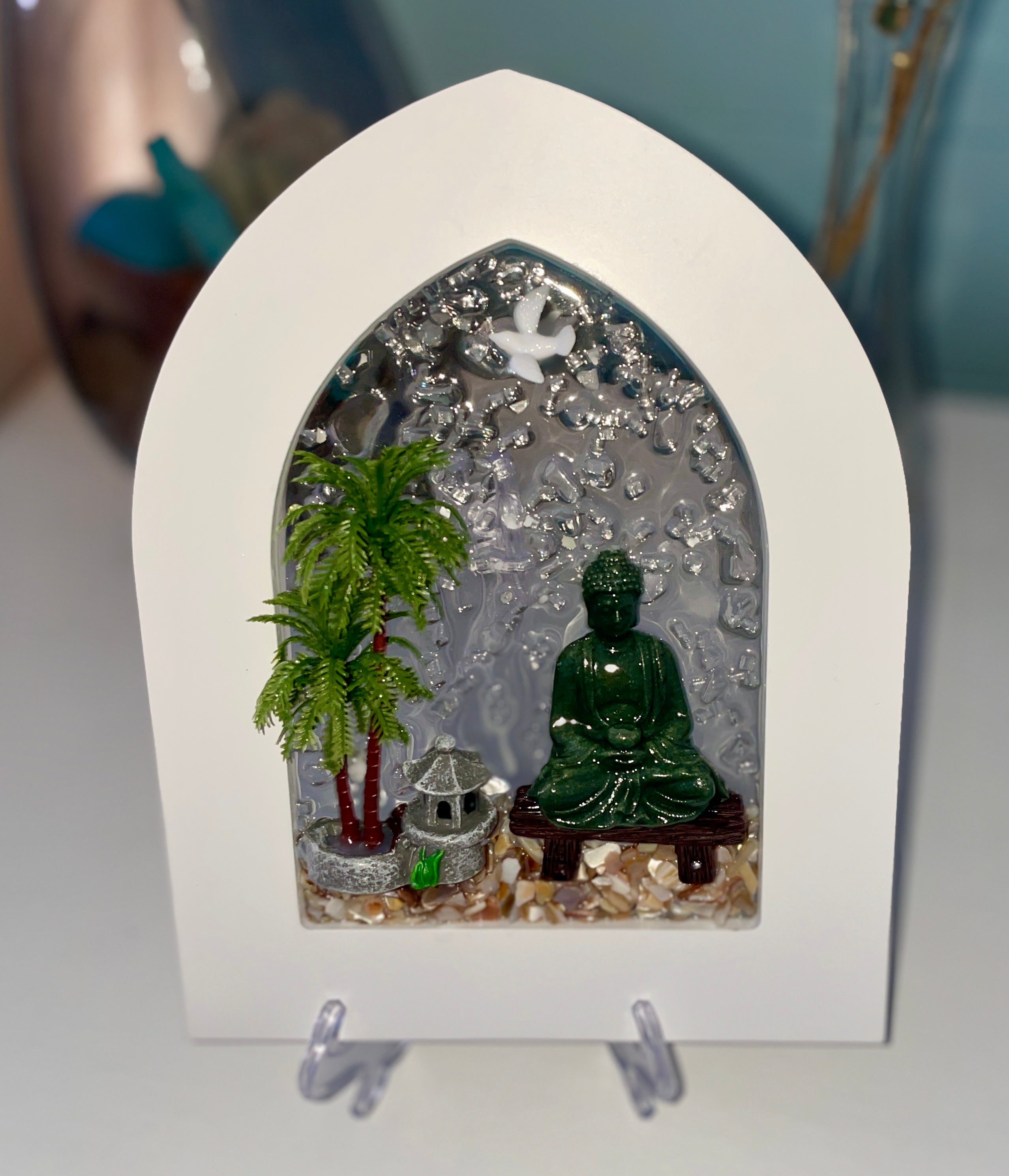 Buddha Relaxing on Bench with Palm Tree – 7" x 9" | Beach Vibe