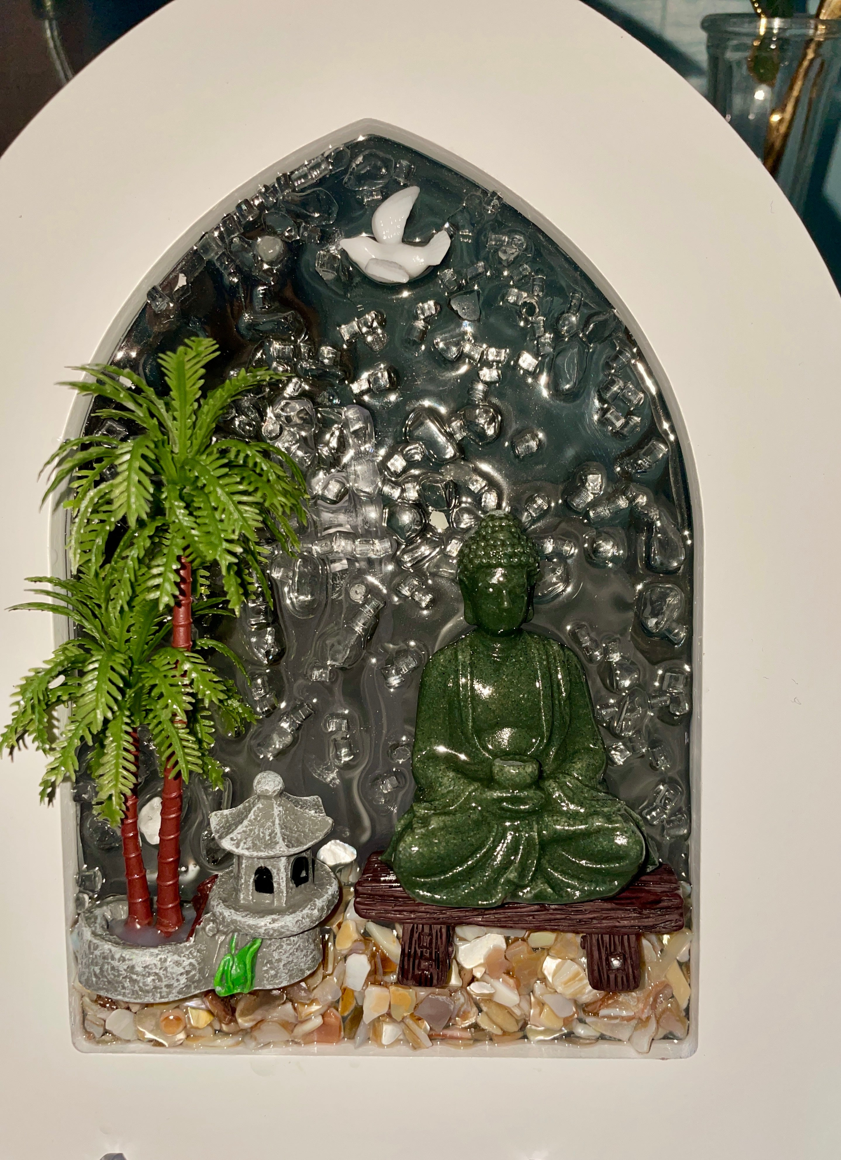 Buddha Relaxing on Bench with Palm Tree – 7" x 9" | Beach Vibe
